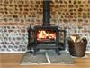 Beautiful central wood burner to lounge area