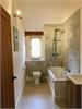 Large Family Bathroom with vaulted ceiling